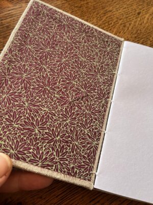 Carnet reliure copte aubergine et vert pistache